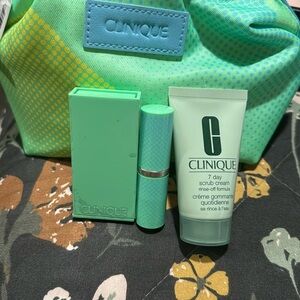 Clique makeup bag with eyeshadow, lipstick and scrub cream